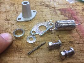 Throttle pedal return spring bracket