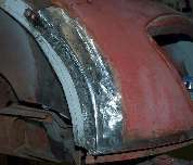 front shroud to inner fender panel