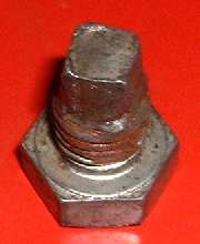 Grind a tapered square on a 5/8 inch bolt